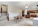 Open kitchen with granite countertops, dark wood cabinets and stainless appliances at 5588 Holcomb Bridge Ct, Las Vegas, NV 89149