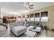 Inviting living area with a comfortable sectional sofa and an open view of the kitchen at 5588 Holcomb Bridge Ct, Las Vegas, NV 89149