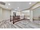 Upper-level landing area with hardwood floors, offering an open view of the home's layout at 5588 Holcomb Bridge Ct, Las Vegas, NV 89149