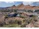Luxury homes nestled in the desert landscape with stunning mountain views and nearby golf course at 6 Via Vasari # 105, Henderson, NV 89011