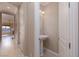 Powder room with pedestal sink and light fixture at 6 Via Vasari # 105, Henderson, NV 89011