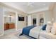 Bedroom featuring an ensuite bathroom and walk-in closets at 6 Via Vasari # 105, Henderson, NV 89011