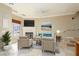 Inviting living room featuring a fireplace, neutral tones, and comfortable seating, ideal for relaxation and entertaining at 6 Via Vasari # 105, Henderson, NV 89011