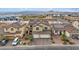 Aerial view of the home featuring a two-car garage, desert landscaping and a solar panel system at 640 Finch Island Ave, Henderson, NV 89015