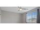Bedroom with ceiling fan, window, and neutral tones at 640 Finch Island Ave, Henderson, NV 89015