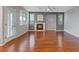 Cozy living room features hardwood floors, neutral walls, and a modern fireplace at 640 Finch Island Ave, Henderson, NV 89015