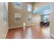 Spacious living room featuring high ceilings, lots of natural light and wood floors at 640 Finch Island Ave, Henderson, NV 89015