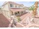 Expansive backyard with covered patio, perfect for outdoor entertaining and relaxation at 6630 Cave Rock Ave, Las Vegas, NV 89110