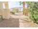 Ornate wrought iron gate and charming brick pathway leading to the property entrance at 6630 Cave Rock Ave, Las Vegas, NV 89110