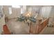 Welcoming living room featuring tile flooring, comfortable sofas, natural light, and decorative elements at 6630 Cave Rock Ave, Las Vegas, NV 89110