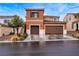 Charming two-story home featuring a two car garage and beautiful desert landscaping at 817 Great Sky Ct, North Las Vegas, NV 89084