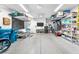 Spacious garage with overhead storage and ample room for parking and projects at 8507 Insignia Ave # 102, Las Vegas, NV 89178