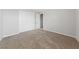 Bedroom featuring neutral carpeting and a double door closet for ample storage at 8675 Principato St, Las Vegas, NV 89166