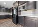 Modern kitchen featuring stainless steel appliances and stylish cabinetry at 8675 Principato St, Las Vegas, NV 89166
