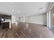 Spacious living room featuring hardwood floors and an open floor plan at 8675 Principato St, Las Vegas, NV 89166