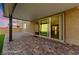 Covered patio featuring an extensive seating area, perfect for outdoor entertaining with a seamless indoor/outdoor flow at 8675 Principato St, Las Vegas, NV 89166