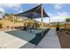 A colorful community playground provides a fun and safe space for children to play and socialize at 8675 Principato St, Las Vegas, NV 89166