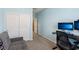 Bedroom featuring a sofa, large closet, desk, and carpet flooring at 9625 W Meranto Ave, Las Vegas, NV 89178