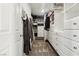 Walk-in closet with custom shelving, drawers and ample storage space at 9625 W Meranto Ave, Las Vegas, NV 89178