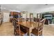 Open dining area with seating for six, seamlessly connected to the kitchen and living spaces at 9625 W Meranto Ave, Las Vegas, NV 89178