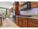 Charming kitchen with granite countertops and stainless steel appliances at 9625 W Meranto Ave, Las Vegas, NV 89178
