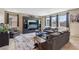 Comfortable living room featuring a large window and neutral color scheme at 9625 W Meranto Ave, Las Vegas, NV 89178