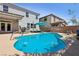 Backyard featuring a sparkling swimming pool with a spacious deck for outdoor enjoyment and relaxation at 9625 W Meranto Ave, Las Vegas, NV 89178