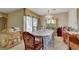 Classic dining room with chandelier and access to other parts of the house at 1041 E Saint Louis Ave, Las Vegas, NV 89104