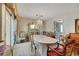 Dining room with large table, decorative chandelier, and access to outside at 1041 E Saint Louis Ave, Las Vegas, NV 89104