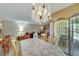 Bright dining room with chandelier, table, and chairs at 1041 E Saint Louis Ave, Las Vegas, NV 89104
