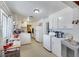 Bright kitchen with ample counter space, white appliances, and functional layout at 1041 E Saint Louis Ave, Las Vegas, NV 89104