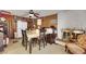 Cozy living room featuring a fireplace, wood paneled walls, and comfortable seating at 1041 E Saint Louis Ave, Las Vegas, NV 89104