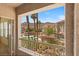 Enjoy views of the community pool and mountains from the private balcony with white metal railing at 10550 W Alexander Rd # 2017, Las Vegas, NV 89129