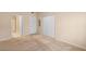 Neutral bedroom features carpet, closet with sliding doors, and attached bathroom at 10550 W Alexander Rd # 2017, Las Vegas, NV 89129
