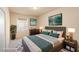 Cozy bedroom with a queen-sized bed, soft lighting, and stylish decor for a relaxing ambiance at 10550 W Alexander Rd # 2017, Las Vegas, NV 89129