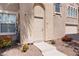 Exterior front entrance, showcasing a well-maintained path leading to the front door at 10550 W Alexander Rd # 2017, Las Vegas, NV 89129