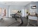 Gym features modern equipment, television, weights, and exercise equipment at 10550 W Alexander Rd # 2017, Las Vegas, NV 89129