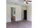Carpeted bedroom that offers a convenient pass-through to the bathroom at 1160 Golf Club, Laughlin, NV 89029