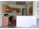 Kitchen featuring oak cabinets, light countertops, and modern appliances at 1160 Golf Club, Laughlin, NV 89029