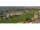 Overhead view of a community golf course, with lush fairways winding between beautiful homes at 1264 Olivia Pkwy, Henderson, NV 89011