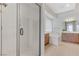 Bright bathroom with a tiled shower, soaking tub, and dual vanities at 1264 Olivia Pkwy, Henderson, NV 89011