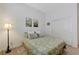 Bright bedroom with modern decor, a comfortable bed, and ample closet space at 1264 Olivia Pkwy, Henderson, NV 89011