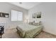 Cozy bedroom with a mini fridge and natural light at 1264 Olivia Pkwy, Henderson, NV 89011