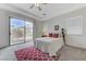Light-filled bedroom features sliding glass doors leading to the backyard at 1264 Olivia Pkwy, Henderson, NV 89011