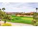 Overhead view of the lush golf course with mountains in the distance at 1264 Olivia Pkwy, Henderson, NV 89011