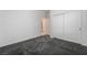 Neutral bedroom with sliding closet doors and modern carpet at 1273 Olivia Parkway Pkwy, Henderson, NV 89011