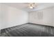 Spacious main bedroom with ceiling fan and neutral colored walls and carpet at 1273 Olivia Parkway Pkwy, Henderson, NV 89011