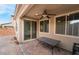 Covered patio with ceiling fan, outdoor furniture, and sliding glass door access at 1273 Olivia Parkway Pkwy, Henderson, NV 89011
