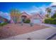 Charming single-story home featuring desert landscaping and a two-car garage at 1309 Misty View Ct, North Las Vegas, NV 89031