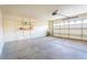 Garage with large door, built-in shelving, and space for two cars at 1309 Misty View Ct, North Las Vegas, NV 89031